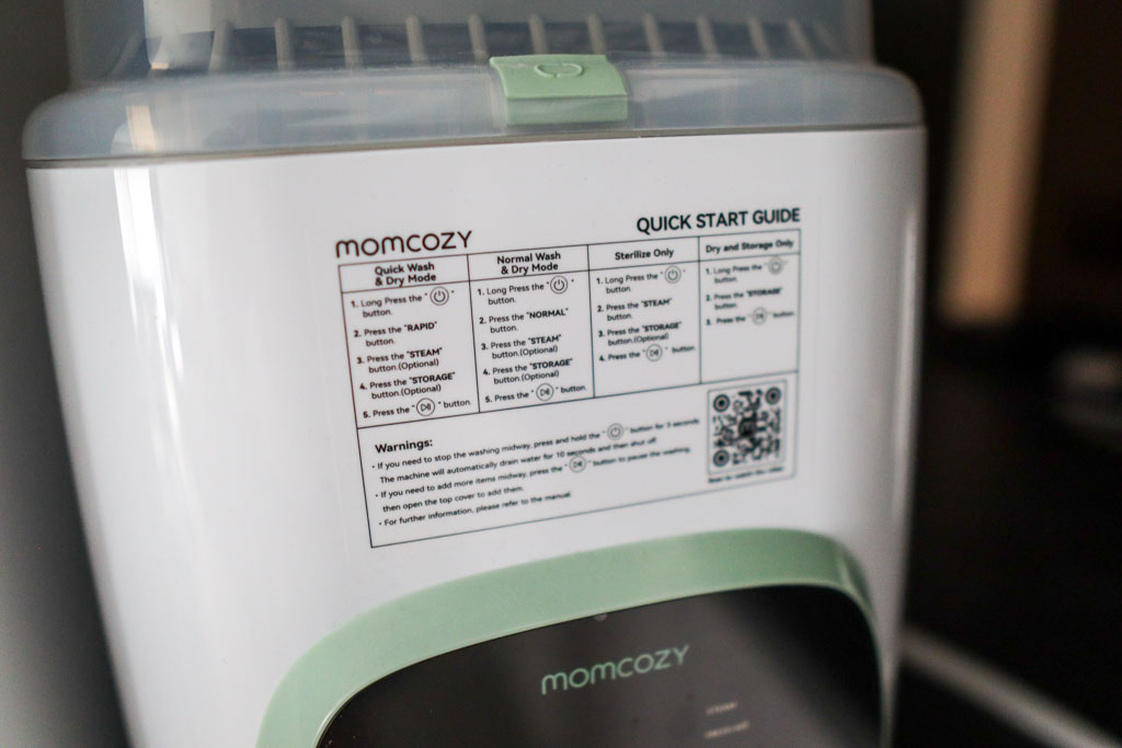 A photo of the quick start guide on the front of the Momcozy KleanPal Pro.