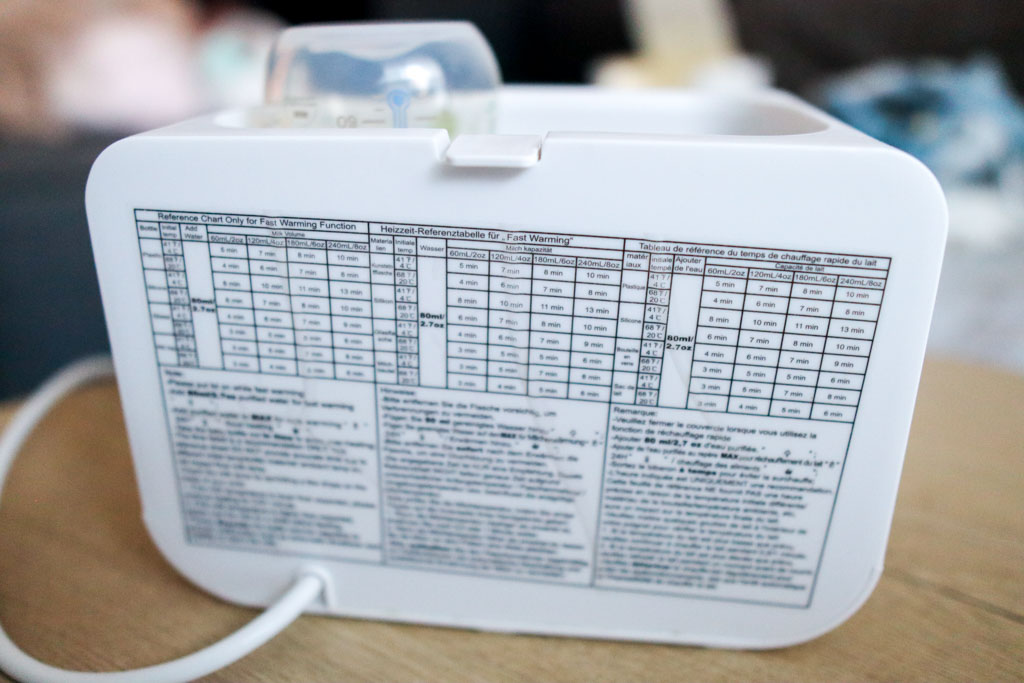 The quick warming reference chart on the back of the Grownsy 8-in-1 Bottle Warmer.